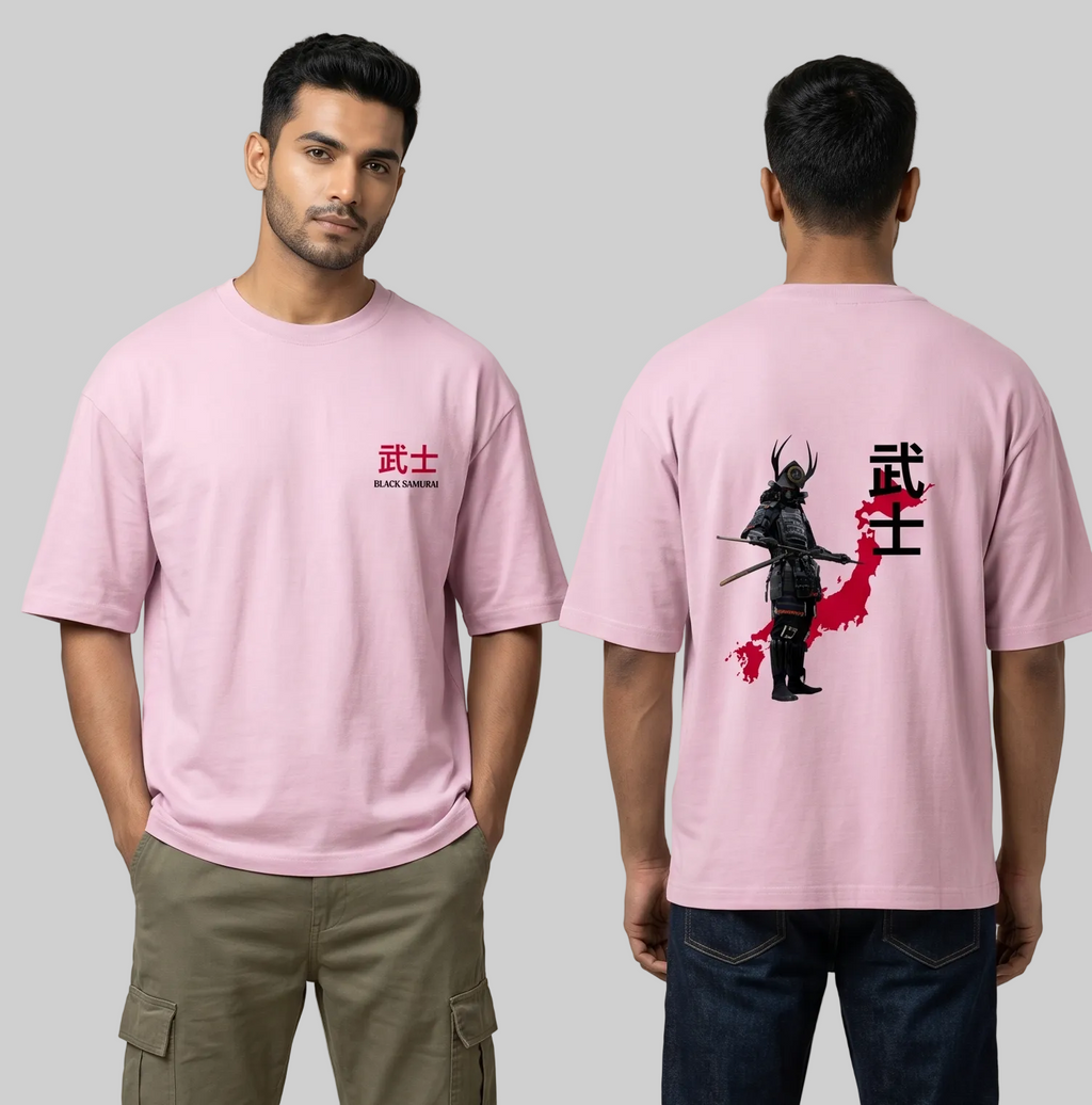 Person wearing a pink t-shirt with a design on the front and back, standing against a plain background.