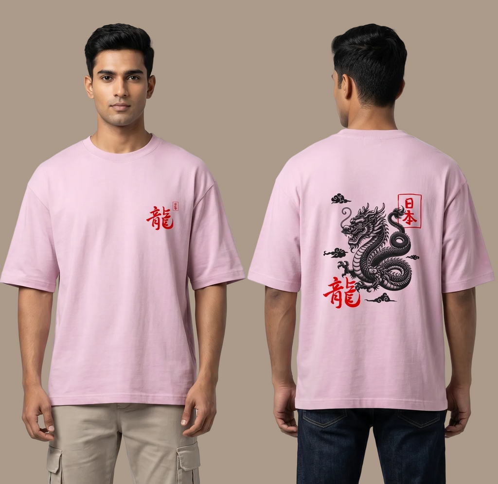 Person wearing a pink t-shirt with a dragon design on the front and back, on a plain background.