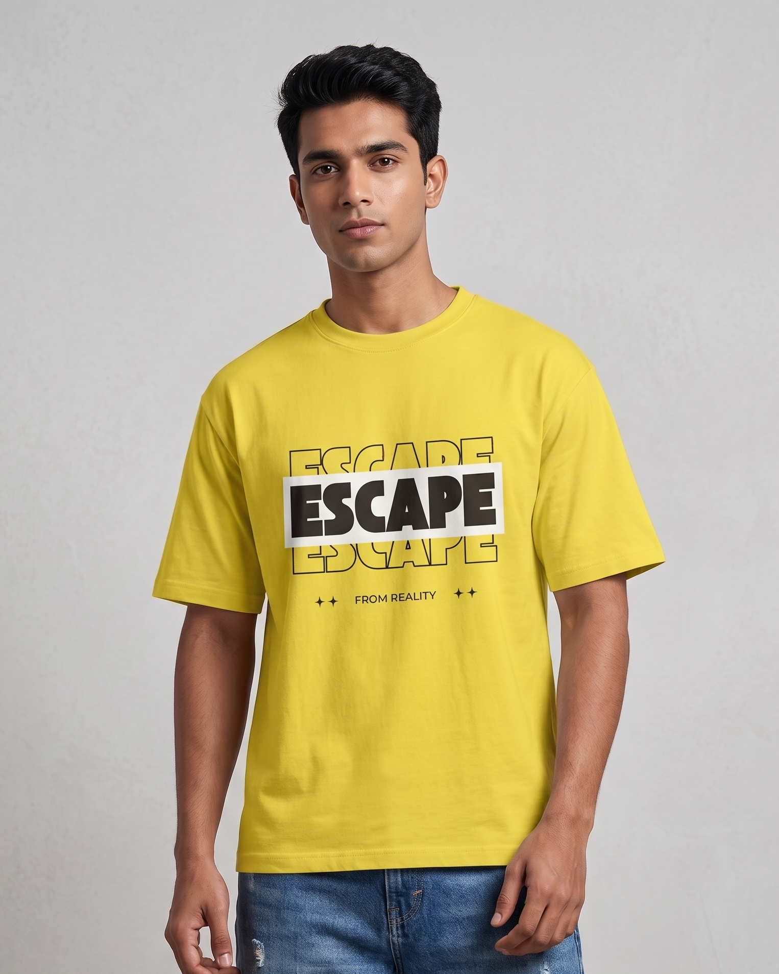 Man wearing a yellow t-shirt with 'ESCAPE' text on a gray background