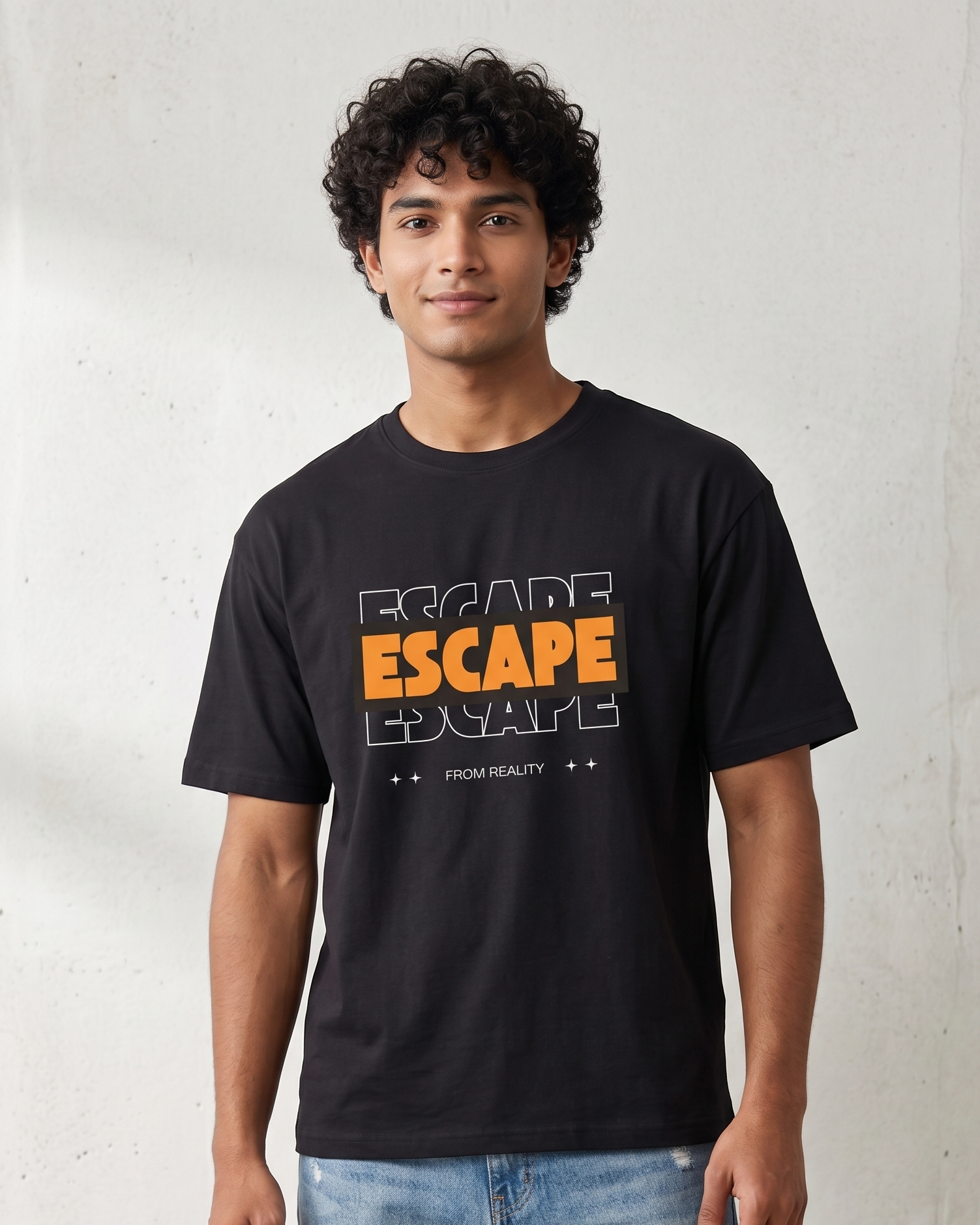 Person wearing a black t-shirt with 'ESCAPE' text in orange and white on a light gray background