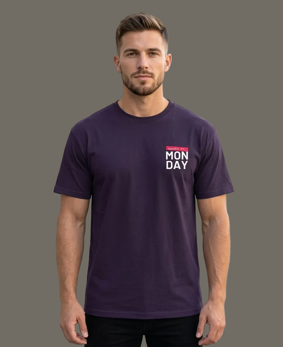 Man wearing a purple t-shirt with 'MON DAY' text, grey background