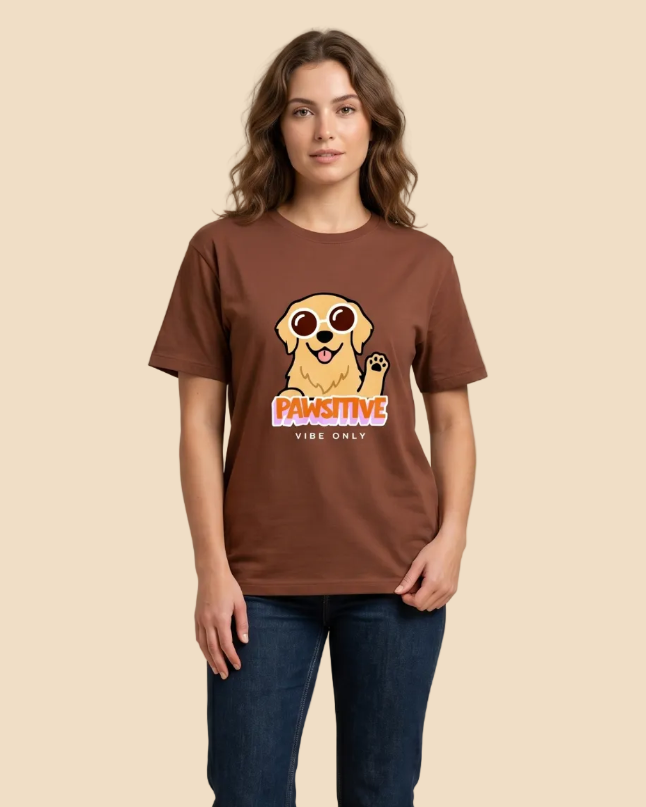 Woman wearing a brown t-shirt with a dog graphic and text on a beige background