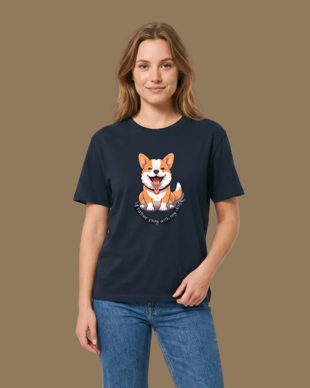 Person wearing a navy t-shirt with a dog graphic and blue jeans on a beige background