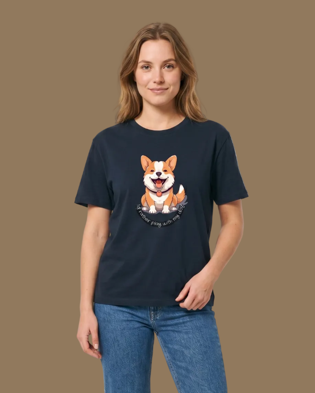 Person wearing a navy t-shirt with a dog graphic and blue jeans on a beige background