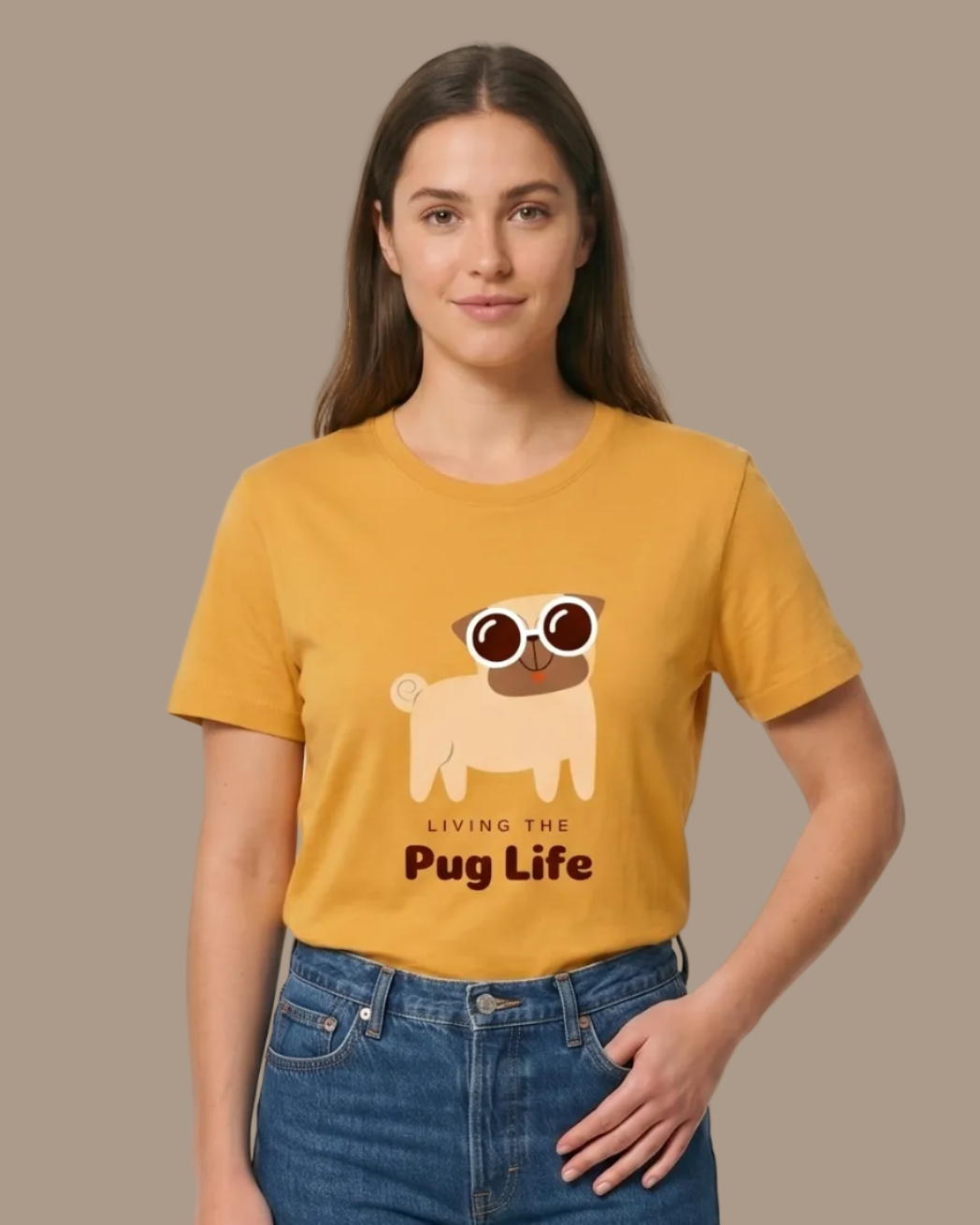 Person wearing a yellow t-shirt with a pug graphic and text on a plane background