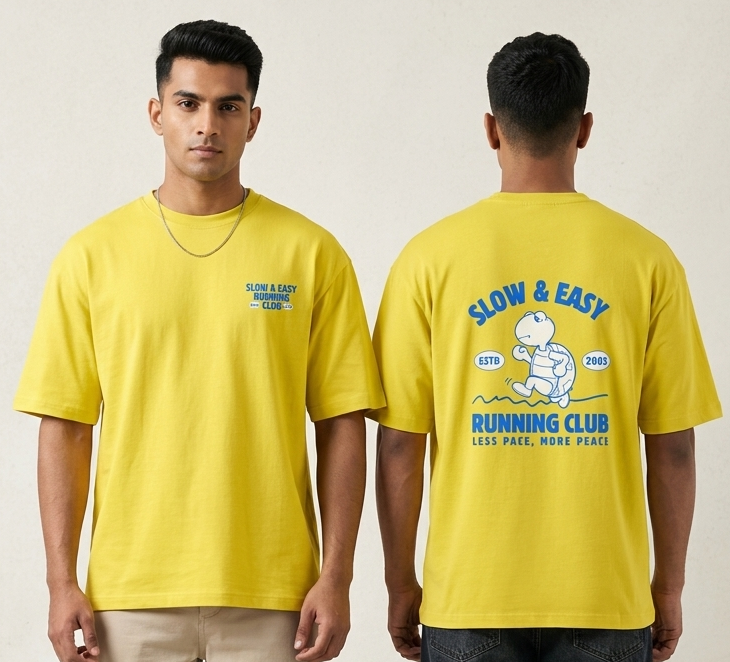 Two people wearing yellow t-shirts with different designs on a plain background