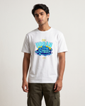 Person wearing a white t-shirt with 'Urban Street' graphic design on a plain background